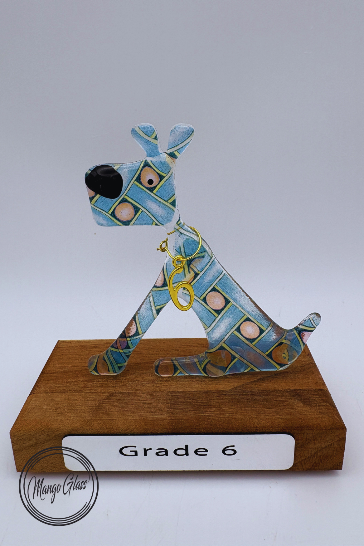Grade 6 Sitting Dog in Wicker Glass